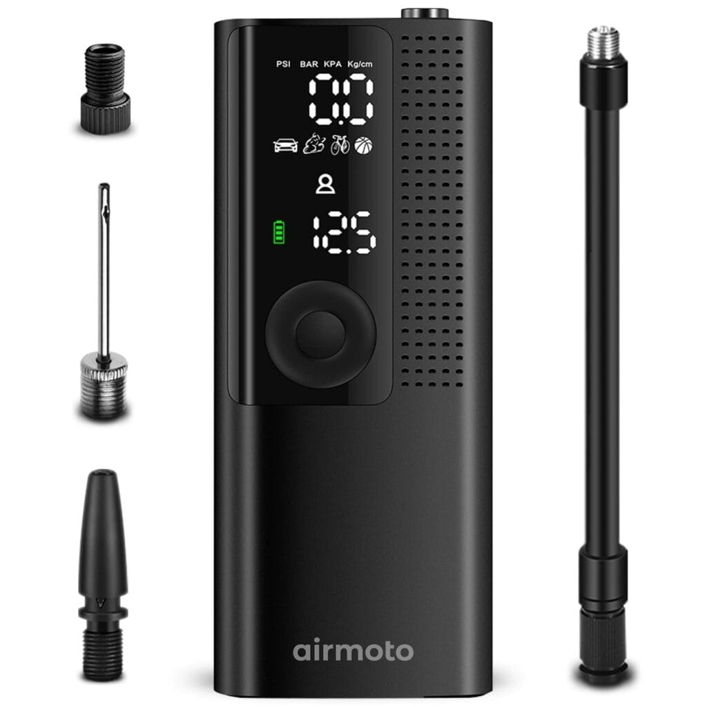 A black device with a screen and a screwdriver, the Airmoto Portable.